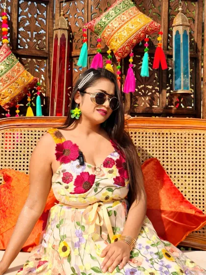 A close-up in my floral outfit, ready for a fun-filled Haldi. The colorful theme of the event called for an equally vibrant look.