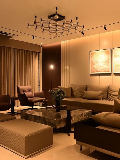 Another view of a completed living room, showcasing how warm, layered lighting can create an inviting atmosphere. Every light is controllable and dimmable.