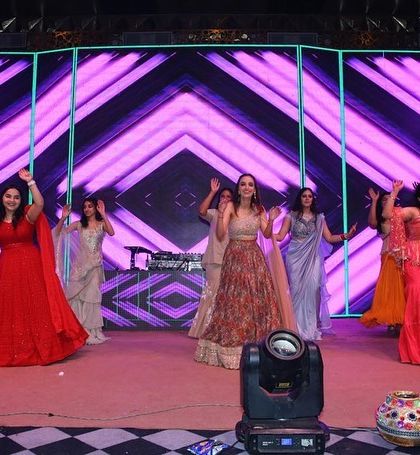 A full view of the bride's squad performance. We work on stage formations to ensure the performance is visually dynamic and engaging.