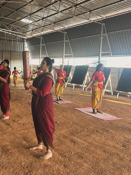 Female students participate in strength conditioning exercises. The Gurukul provides equal training for all, ensuring every student develops the physical foundation needed for the art.