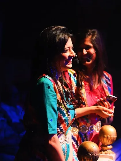 A candid moment backstage. As founders, we are involved in every detail to ensure our shows are a seamless and magical experience.