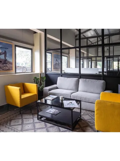 Our commercial interiors balance function with a strong corporate identity. In this Nagpur office, we used a minimalist Scandinavian design language with pops of color and glass partitions to create a welcoming yet professional waiting area that feels open and connected.
