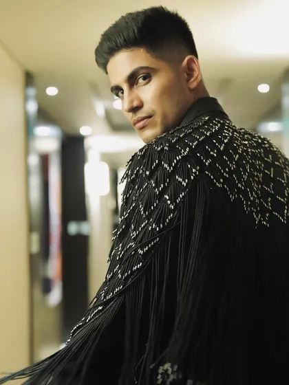 The details make the look. This shot of Shubman Gill shows the back of the fringed Rohit Gandhi and Rahul Khanna jacket, highlighting the incredible craftsmanship and movement of the piece.