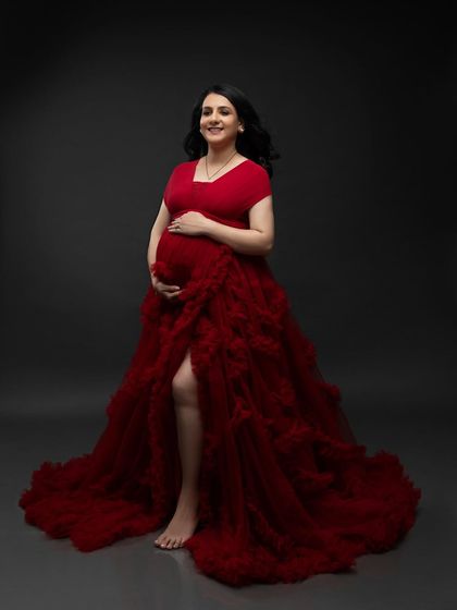 A joyful portrait in a lovely red ruffled gown. The A-line shape and high slit offer a comfortable yet elegant option from my client wardrobe.