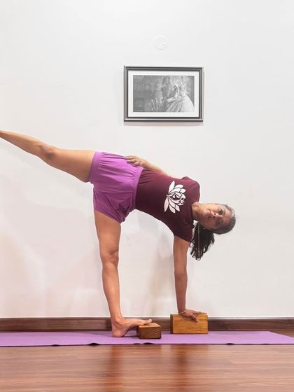 Ardha Chandrasana (Half Moon Pose) at the wall. Yoga is not an addiction; it is a cultivation of what is good for life. Drugs are psycho-toxic; yoga is a psycho-elixir.