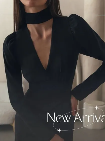 A close-up of my Slyther dress, focusing on the distinctive choker detail and V-neckline. This design adds a modern edge to the classic little black dress.