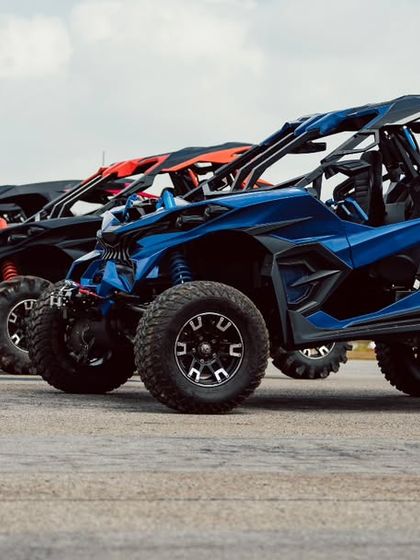 A lineup of Can-Am Maverick X3s, all-terrain vehicles that bring a different kind of off-road power to our event.