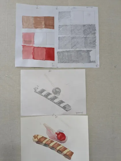 A closer look at the technical skills learned in class. This includes value scales in pencil and watercolor, along with observational drawings of a sweet treat.