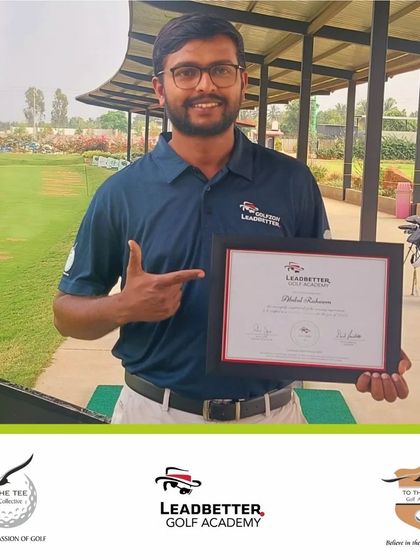 Coach Abdul Raheem points to his Leadbetter certification, a mark of his dedication to professional development and coaching excellence.
