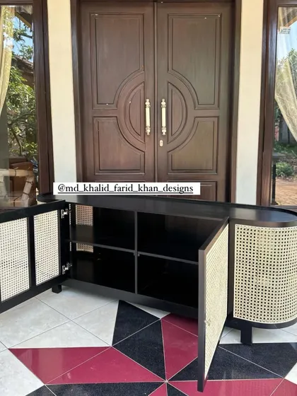 The sideboard with doors open from a different angle.