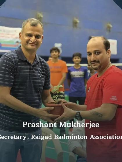 Prashant Mukherjee, Secretary of the Raigad Badminton Association, being welcomed. I ensure that visiting officials are formally recognized for their contribution to the sport.