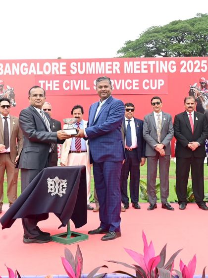 The Civil Service Cup being presented by Shri. Manoj Kumar, IFS. This event is a testament to our deep-rooted connections with the state's administrative leadership.