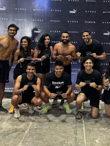 The whole crew celebrating after a successful HYROX event. This is what it's all about: setting goals, putting in the work, and achieving them as a team.