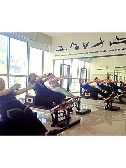 The Pilates method teaches you to be in control of your body. This teaser variation is a perfect example of core strength and coordination in action.