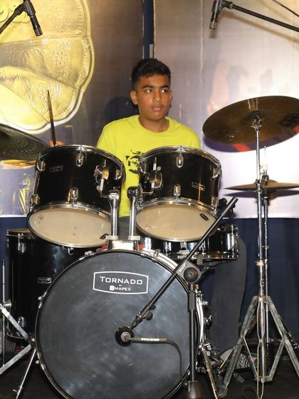 Another action shot of Hemanth during the powerful drum cover.