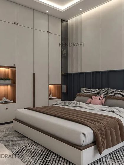 This angle shows the clever wardrobe design, which includes open, backlit niches for displaying favorite items, adding a personal touch to the room.