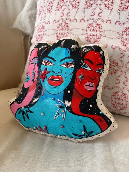 The finished three-faced mood pillow, a unique piece of functional art.