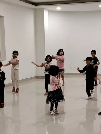 A typical day in one of our kids' dance classes. We focus on creating a supportive and fun environment where children can learn new steps, make friends, and express themselves freely.