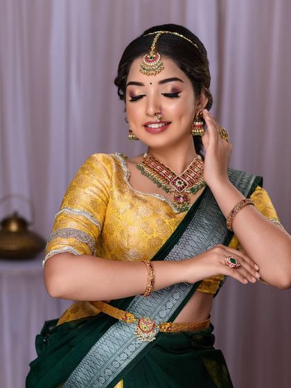 A smiling shot of the engagement look, highlighting the natural-looking base and dimples.