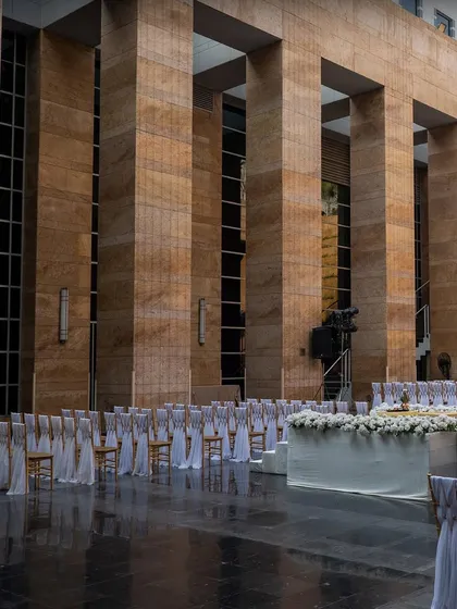 The guest seating arrangement for a modern wedding ceremony at the Grand Hyatt, showcasing a clean, elegant, and organized setup.