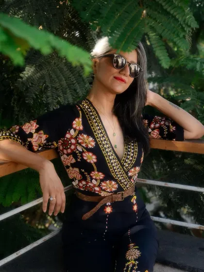 Another view of the jumpsuit, a perfect piece for effortless style.