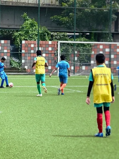 A view of a practice match on the turf. We simulate real game scenarios in training to prepare our players for competitive youth leagues.