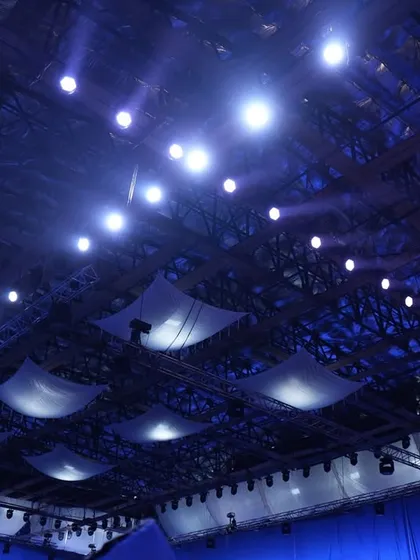 The overhead lighting rig for 'Uyi Amma', featuring ARRI SkyPanels and moving washes to create a cool, nighttime ambiance.