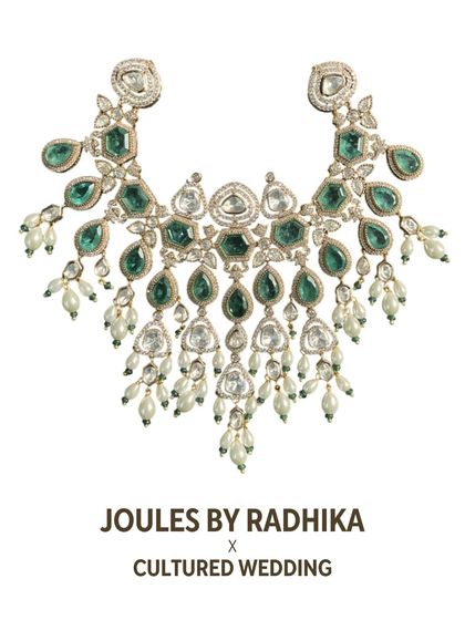 A clean product shot of the emerald and polki diamond necklace featured in Cultured Wedding Magazine, highlighting its intricate design and craftsmanship.