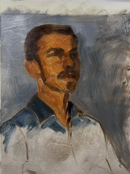 The block-in stage of Satyam's portrait, where I establish the basic shapes of light and shadow. This step is crucial for building the structure and form of the face.
