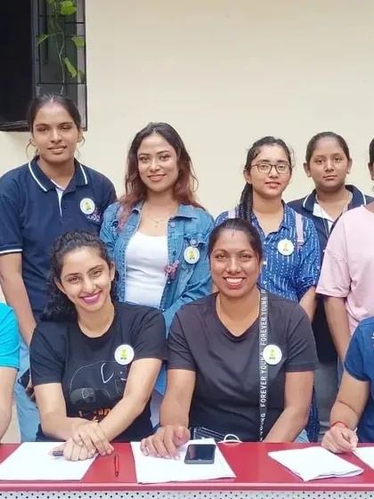 Volunteers at the registration desk for an inclusive job fair. Their support is crucial in ensuring a smooth and welcoming experience for all attendees.