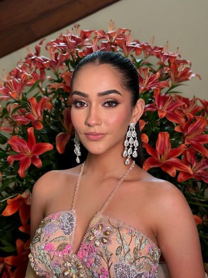 A close-up on the defined eye makeup, which is the centerpiece of this elegant and modern look.