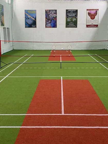 A clear look at our awesome court. This is the first-ever multi-sport turf badminton court in Sion, ready for your best game, day or night.