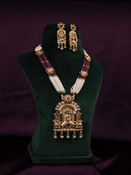 A direct, clear shot of the temple jewellery set on a bust, perfect for catalog listings where detail and accuracy are paramount.