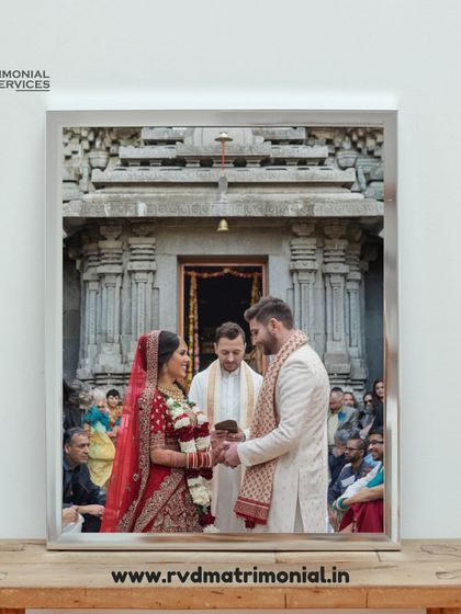 This image of a modern wedding in a traditional temple setting shows how I help couples blend tradition with modernity.