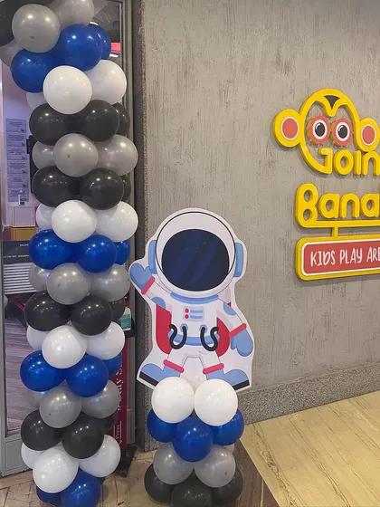 3, 2, 1, blast off. From the moment your guests arrive, they'll be transported to another world. This astronaut cutout and space-themed balloon arch set the stage for an out-of-this-world birthday adventure.