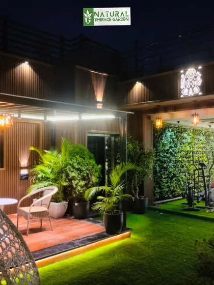 This shot shows the relationship between the seating area, the swing chair, and the gym, all part of the comprehensive Model Town terrace design.
