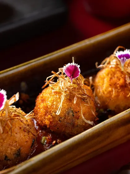 Our Korean Fried Cheese Balls with Gochujang Dressing are the definition of a flavour-forward appetizer. Crispy, cheesy, and a little spicy, they are anything but an afterthought.