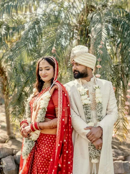 A serene portrait of the bride and groom after their wedding ceremony, standing together in a moment of quiet connection.