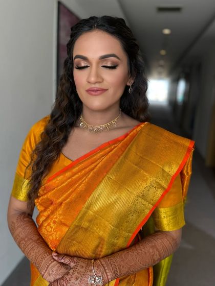 A close up with eyes closed, showing the soft blending of the eyeshadow. We use warm, earthy tones to create a look that is both natural and defined.