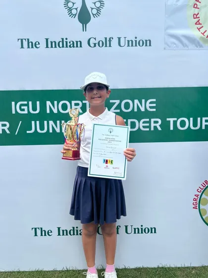 Jenaya Bamnyal proudly holds her 1st position trophy from the IGU North Zone Junior Tour.
