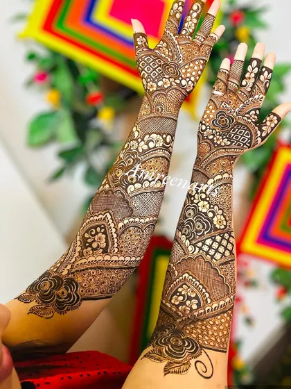 A full-coverage floral design that flows beautifully from the fingers to the elbows, creating a sleeve of pure art.