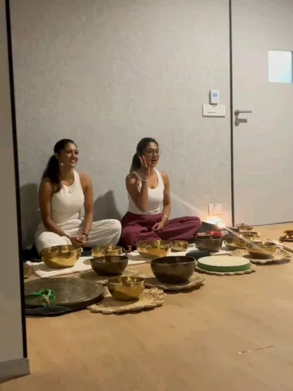 My co-facilitator and I lead a sound healing session for a corporate group. We often work together to manage larger groups and create a rich, multi-instrumental soundscape.