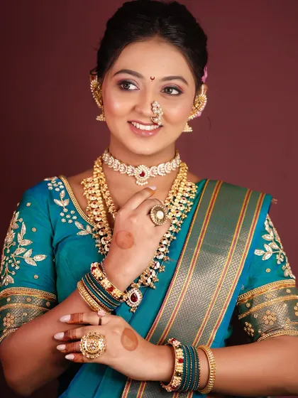 A professional studio shot from our student portfolio session, demonstrating a classic Maharashtrian bridal look.