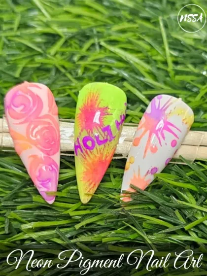 Get ready for Holi with our vibrant neon pigment nail art. This set features bright color splashes, the word "Holi," and neon floral designs that perfectly capture the festival's spirit.