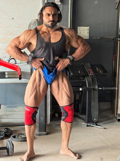 Checking the leg development. Quads are a key part of a balanced physique.