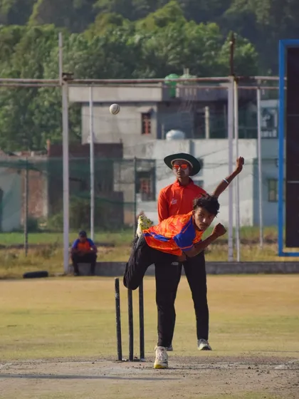 A bowler lets one rip during an ODI game. We train our players to maintain intensity and accuracy throughout the 50 overs, a key skill in limited-overs cricket.
