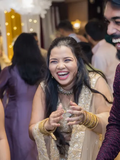 It's not just about the couple; it's about the celebration. We capture the infectious laughter and energy of your guests, preserving the atmosphere of joy that surrounds you on your sangeet night.