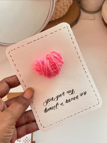 "You gave my heart a home." This card features a cute 3D heart made from a tiny ball of wool. It's so soft and sweet.