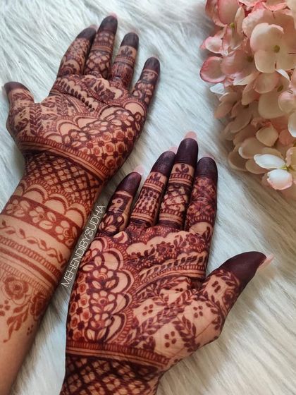 A beautiful flat lay of a developed henna stain, showing the deep, even color against a soft background.