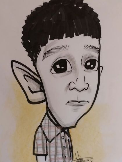 A caricature of a boy with a thoughtful expression, showing that I can capture a range of moods.